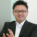現・金融領域事業部 事業部長 西村俊彦様