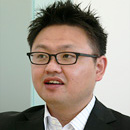 現・金融領域事業部 事業部長 西村俊彦様